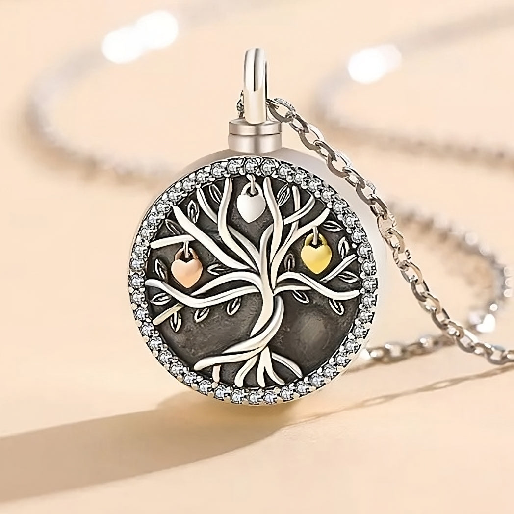 Main image of a cremation necklace that resembles a tree with hearts attached onto it.