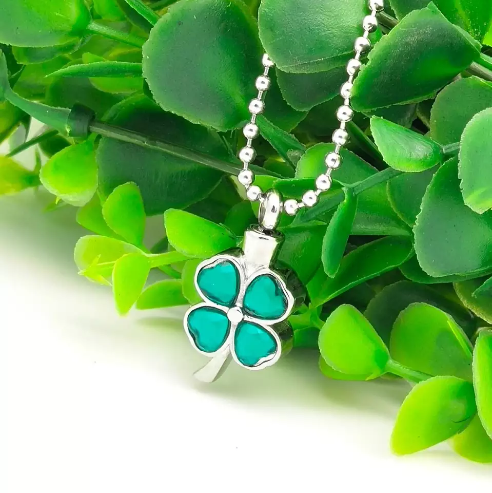 Image of a green clover cremation necklace.